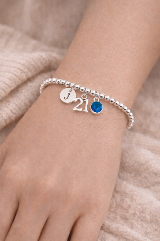 Personalised 21st birthday silver bracelet with initial and birthstone