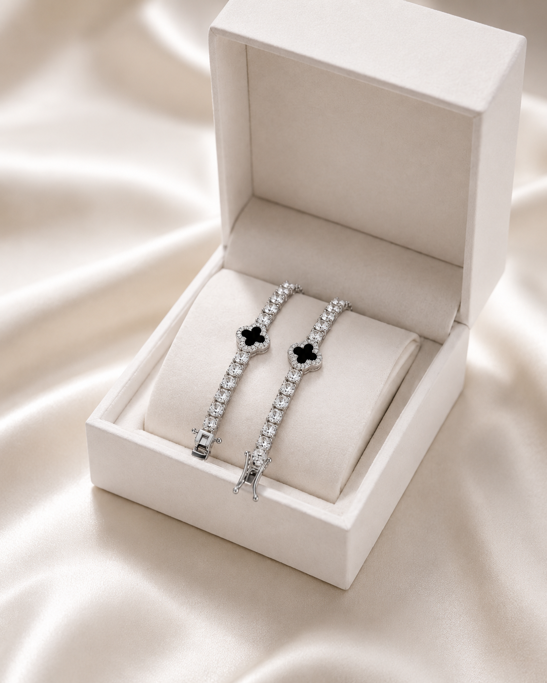 925 sterling silver tennis bracelet with brilliant cut CZ stones and black clover details
