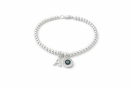 Close up of crystal initial charm bracelet for women