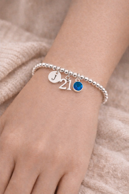 Personalised 21st birthday silver bracelet with initial and birthstone