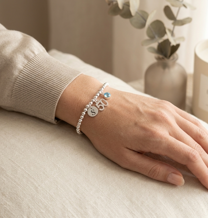 Personalised 50th birthday bracelet silver charm with initial and birthstone