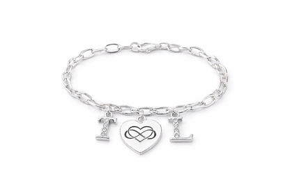 Silver bracelet with heart and infinity charm on a white background