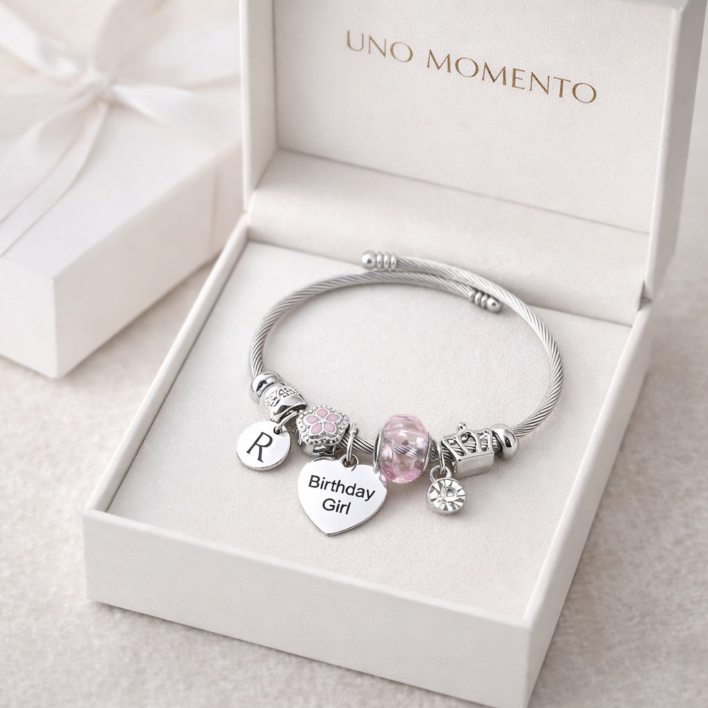 Silver charm bracelet with birthday girl heart charm and blue birthstone
