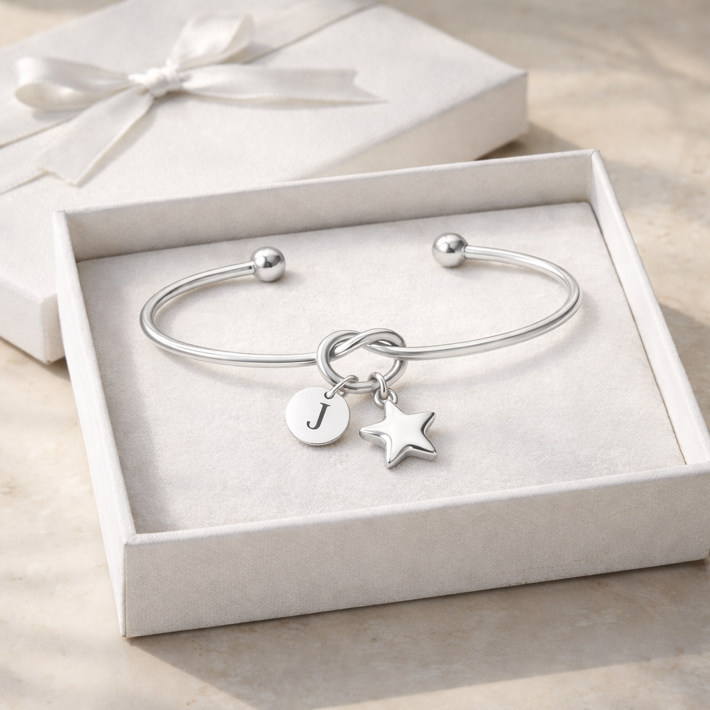 Silver star initial bracelet with engraved charm
