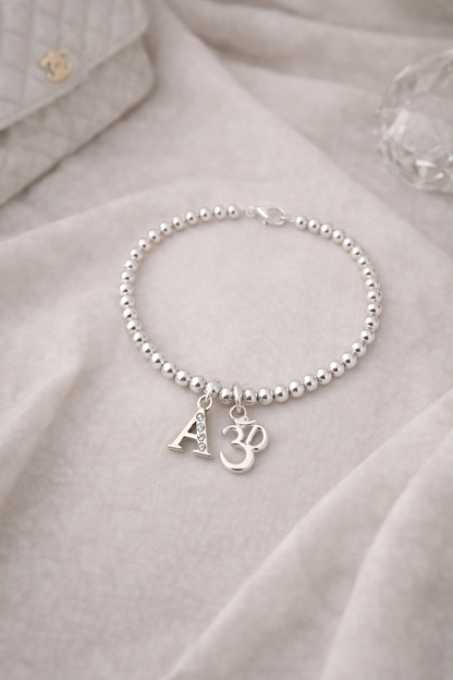 Personalised Silver Om Bracelet with Crystal & Initial – Spiritual Gift for Her