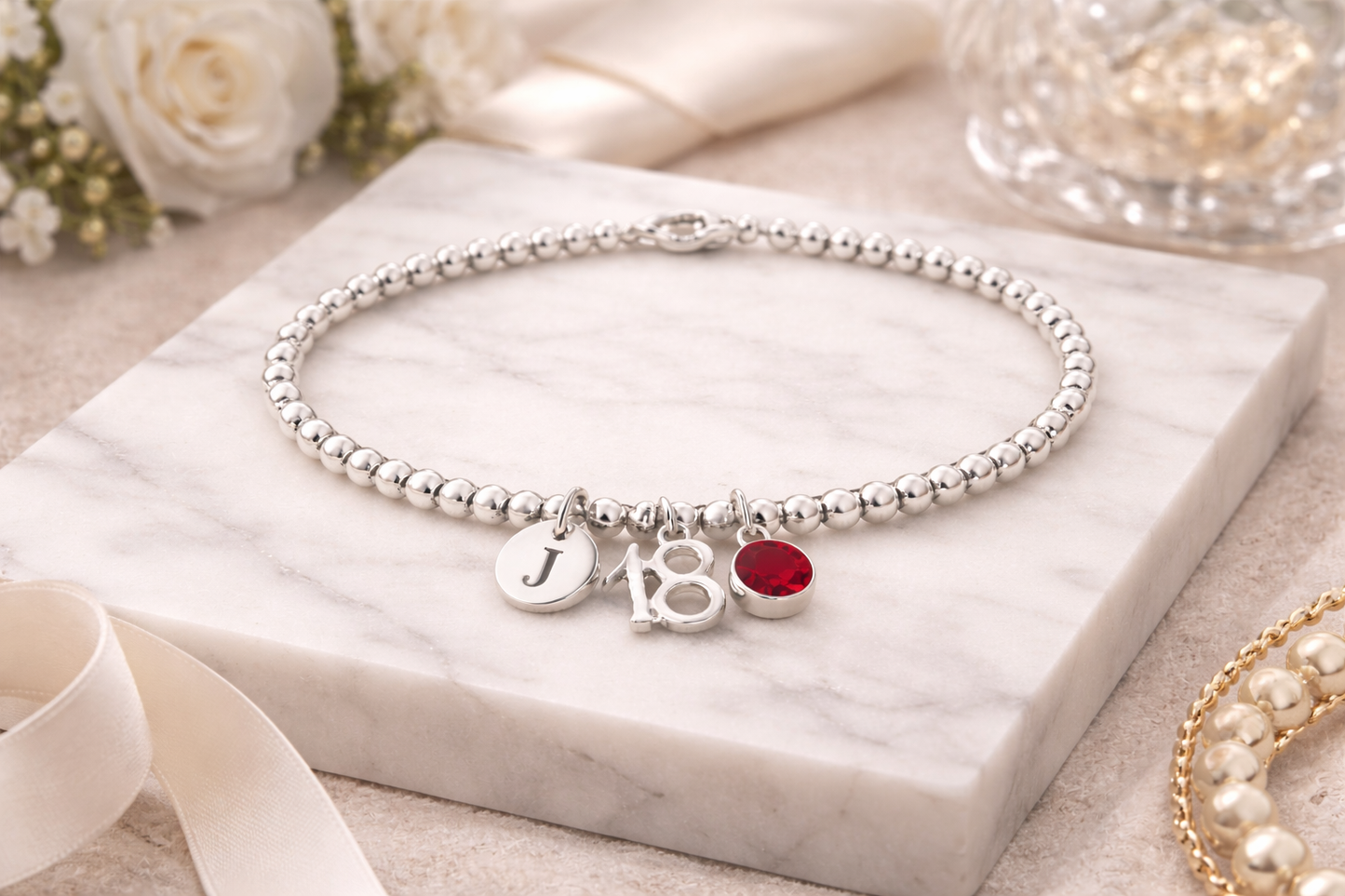 personalised 18th birthday bracelet gift with initial charm.
