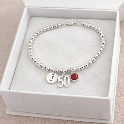silver initial and birthstone bracelet for 50th birthday gift for mum